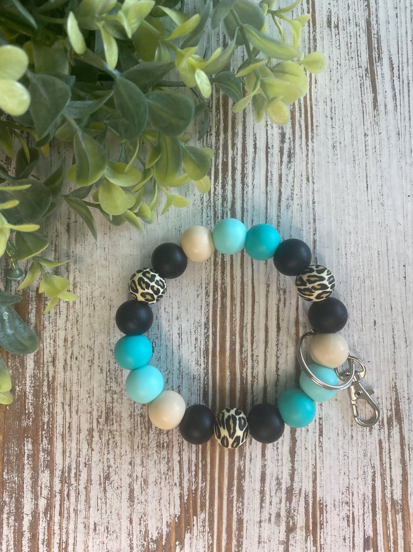 Teal Leopard Wristlet